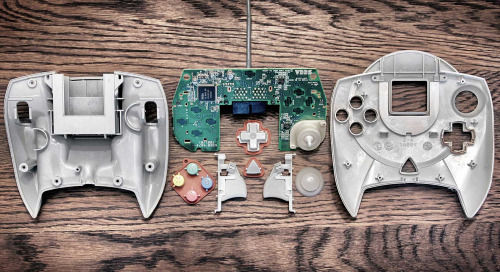 cinemagorgeous:  Many generations of game controllers, taken apart by Brandon Allen. 