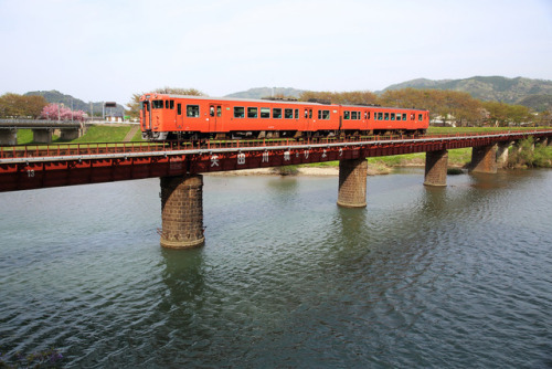 Across the bridge by Teruhide Tomori Kiha 47 Diesel Multiple Unit. The Local train on the San-in Lin