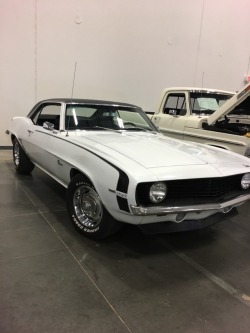 1963to1974:  Here’s a nicely-optioned white 1969 Camaro with a 327, automatic transmission with a column shifter, black interior, D90 striping, N66 rally wheels and black vinyl top. Smart looking car for a non-SS. Would be a sweet daily driver.