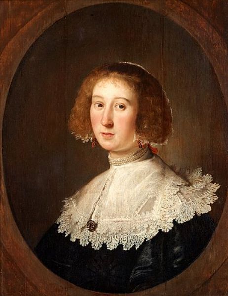 Portrait of a lady in a lace trimmed dress by Paulus Moreelse or Michiel Jan van Mierevelt