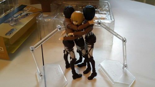 erens-jaeger-bombs:  Eren and Mikasa freeing Armin from his confines and ending in a group hug! 