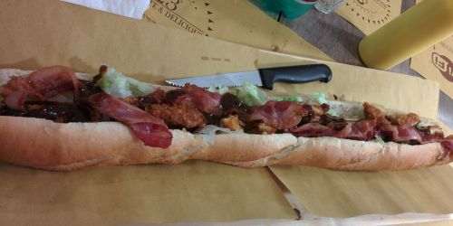 &ldquo;60 cm (2 feet) Baguette with crispy fried chicken, barbecue sauce, bacon, lettuce, caramelize