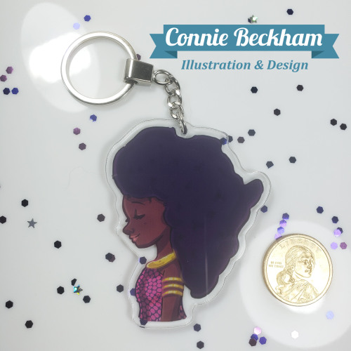 African Girl with Africa shaped natural hair. This keychan is 3 inches and comes with a FREE black l