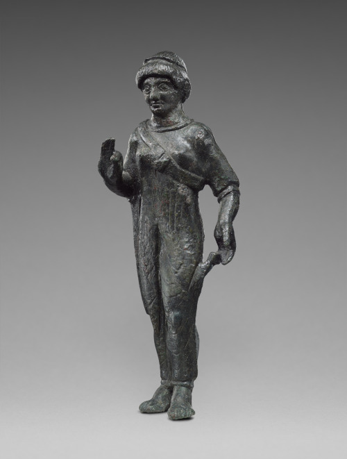 Statue of kore or Phersipnai, the Etruscan equivalent of Persephone. c. 480 BC; bronze. The J. Paul 