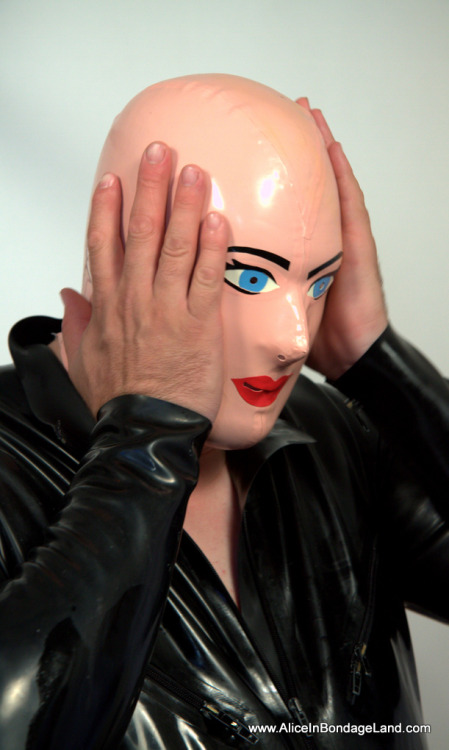 Time to get your game face on, little rubber slut.http://www.aliceinbondageland.com