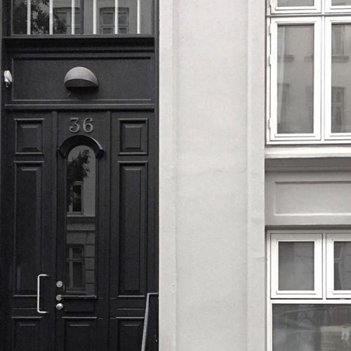 septemberedit:  I have a thing with black doors, old buildings and grand windows. Beautiful Copenhagen. (her: Copenhagen, Denmark) 