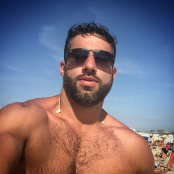 cagedjock:  stratisxx:This greek lebanese daddy on tindr was looking for a young bottom with a smooth ass to fuck in mykonos. He was 6'4, 230lb,  uncut 9&quot; cock. Could you handle that big meat inside you after a long day at the beach… and that monster