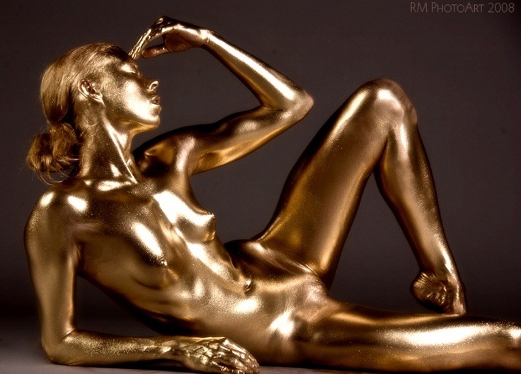 Golden girl painting body