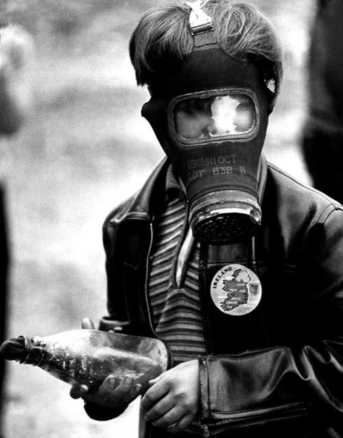 historylover1230: A young Irish boy readies a Molotov cocktail during the Battle of the Bogside agai