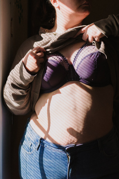 sometimesdesperate:I did another taking my sweater off series but this time with more dramatic lighting and a new bra that I will be returning bc it doesn’t fit right but it does look cute.