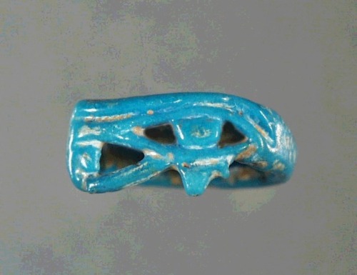 Finger Ring with Wadjet EyeBrilliant blue glazed faience finger ring, with openwork wadjet eye motif