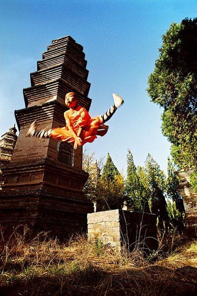 taichi-kungfu-show:  Young kid practicing Shaolin kung fu.    We offer you first-rate tai chi swords on: http://www.icnbuys.com/tai-chi-swords    