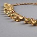 randomitemdrop:athelind:curlicuecal:lemonsharks:jeannepompadour:Moche necklace with gold beads in the shape of toads, 1-800 AD; Peruall modern jewelry designs are canceled, this is peak aestheticthis frog necklace from 1000 years ago has the exact same