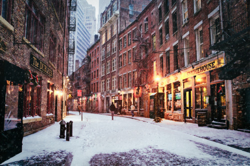 stone street in the snow, new york city