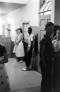  A lone African-American student waits for