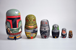 tiefighters:  Bounty Hunter Nesting DollsSet of 6, acrylic on wood, 8″ tall Boba Fett down to a 1.75″ Zuckuss. Signed on the inside and available here.  Created by Andy Stattmiller || Tumblr  Part of the “Art Awakens” charity auction at Gallery1988