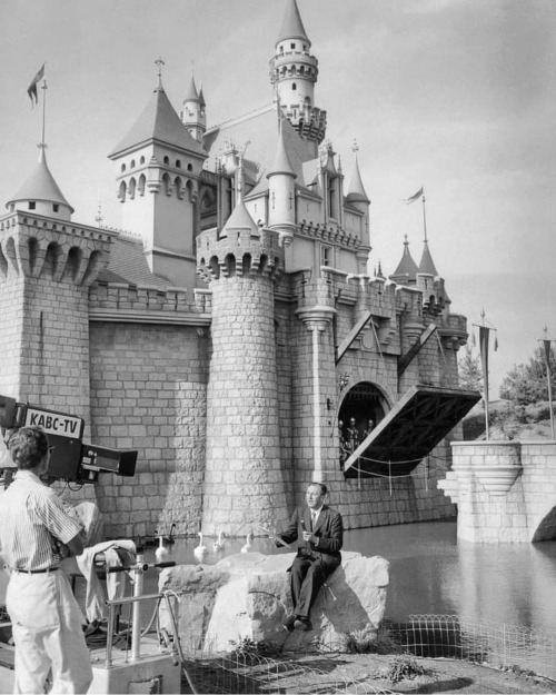 Opening day telecast - Walt reads the Fantasyland dedication as the drawbridge prepares to lower and