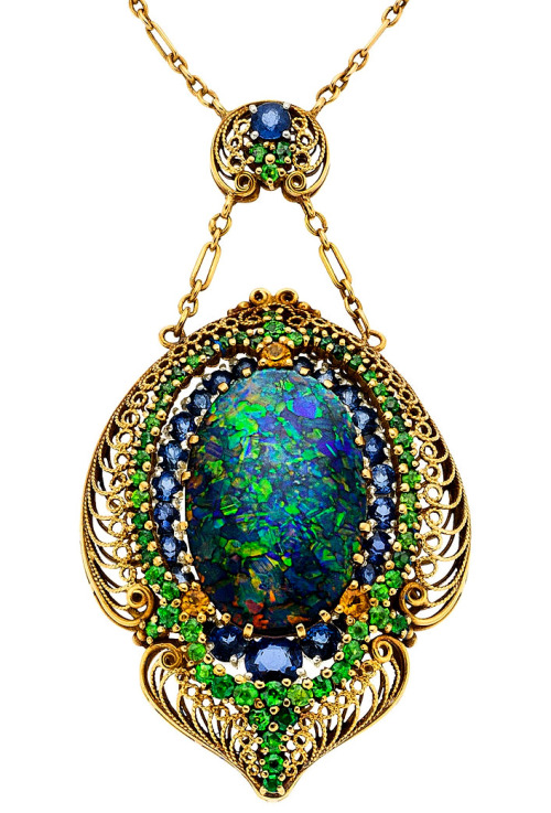 ufansius:Front (top) and rear (bottom) views; gold, black opal, sapphire, and demantoid garnet penda