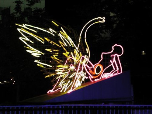 korolevcross: fruitsoftheweb: “Leda and the Swan, in neon, outside Estrel hotel“ estrel 