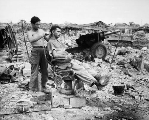  Two men from the 363rd Field Artillery Battalion near Okinawa. June 10, 1945. 