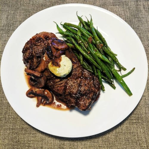 Steak Friday. Prime New York, mushroom wine sauce, blue cheese compound butter, green beans. TGIF! 