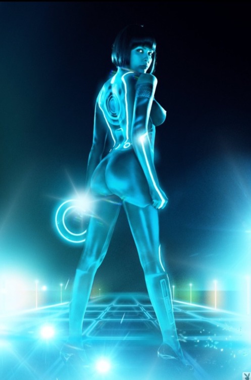 beautiesthenandnow:  Sasckya Porto 💙 Tron Legacy recreated by Playboy 2010