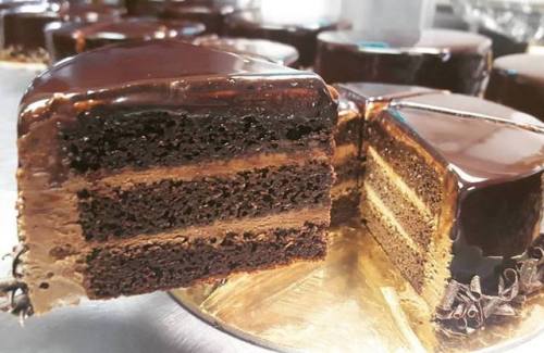 Showing off layers in a Belgium Chocolate Mousse Cake.