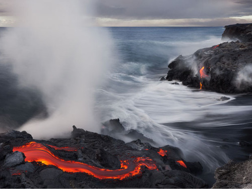 chunkydunkingmermaid:  Photographer Gets So Close to Lava That His Shoes and Tripod Melt   