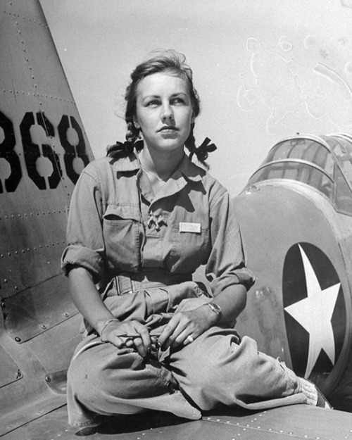 soldiers-of-war:USA. Texas. 1943. Shirley Slade sits on the wing of her Army trainer at Avenger Fiel