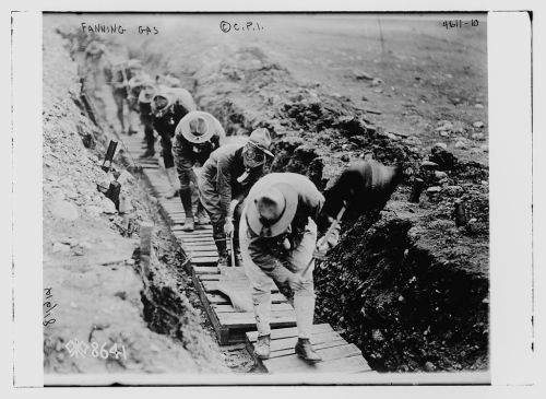 trenchmints:Photo shows American soldiers being trained to use Ayrton or trench fan to clear poisono