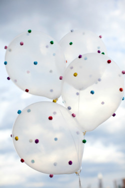 dreamalittlebiggerblog:  These pom pom studded balloons are from Design Improvised. This is fun, simple and everything you need can be purchased at the dollar store. She uses a hot glue gun set to low, but I think I’d still be a bit freaked out. I’d