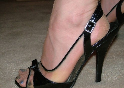 emmajspeed86: nylonstockingnet:I could stare at this for a long long time, black sling back open toe