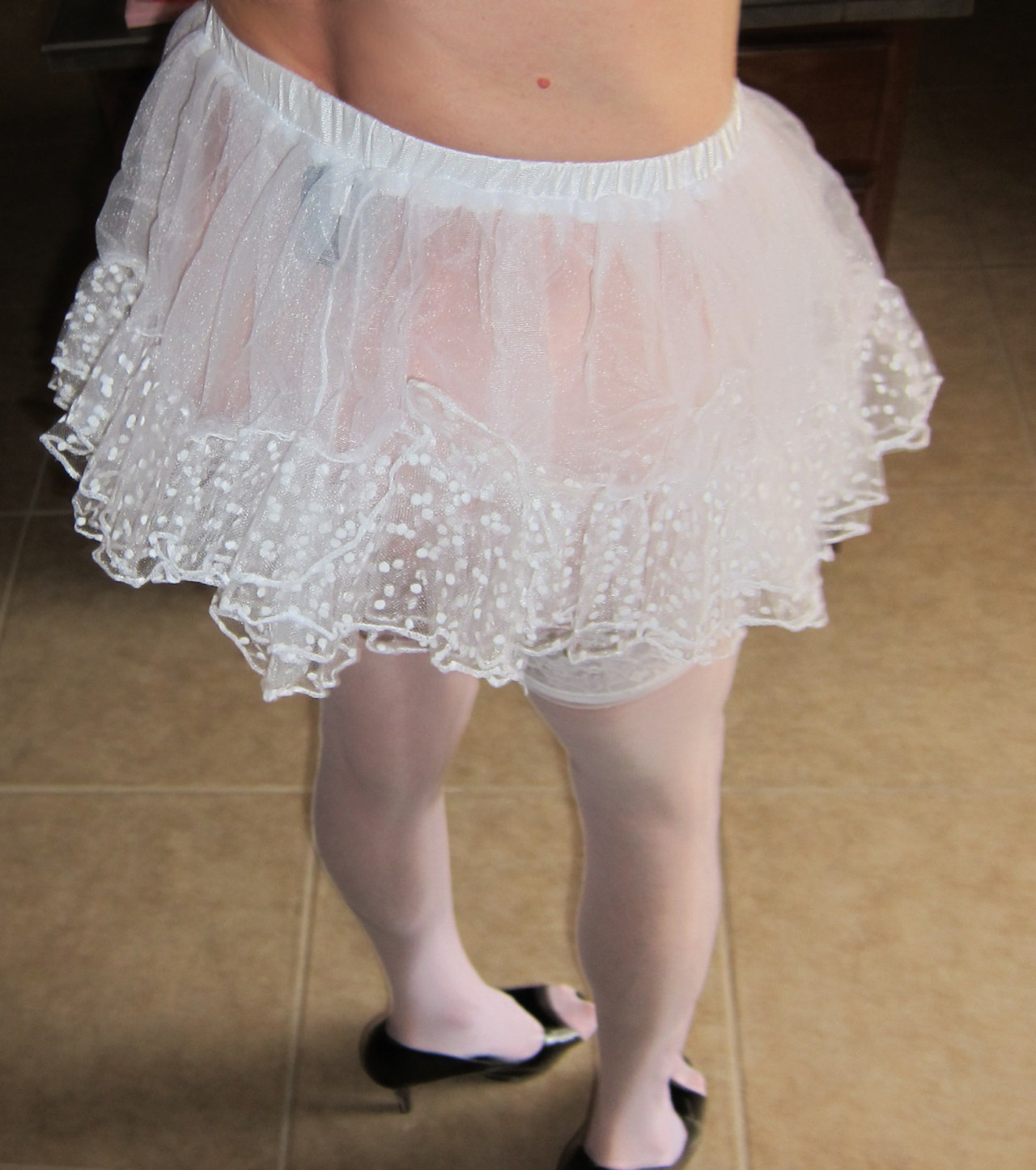 yoursissyfag:  sissyslut faggot plays in her pretty white lacy bra sheer tulle miniskirt