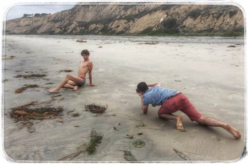 Here I am, in action, during a seaside photoshoot with Evan in San Diego. A very friendly lady passerby snapped these for me on my phone–after saying we needed photos together. Look for Evan relatively soon. He’s a sweetheart, very gregarious