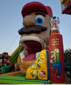 suppermariobroth:  Unlicensed Mario-themed bouncy castle featuring artwork of various Mario series characters.Main Blog | Twitter | Patreon | Store | Source: see bottom of image