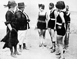 vintagegal:  Women in Chicago being arrested for wearing one piece bathing suits, without the required leg coverings. 1922 (x) (x) 