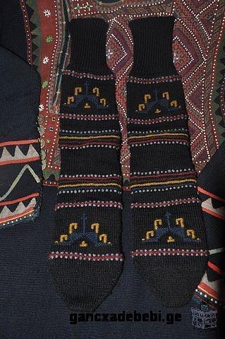 Georgian socks, decorated with inlaid yarn.