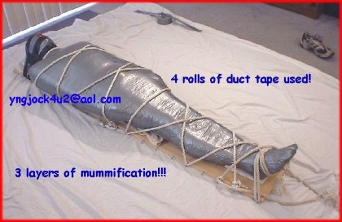 yngjock4u2:Sub is layered with a jock, cup, full length wetsuit, then mummified with 3 layers of duct tape.  He was like this for 6 hours!!!