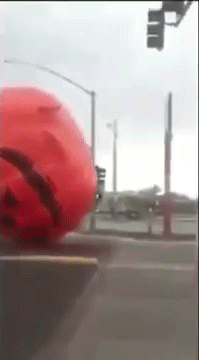 winneganfake:  thingsamylikes:  gofflin:  sizvideos:  Wild giant inflatable pumpkin terrorizes Arizona streets (video)  YOU HAVE ANGERED THE PUMPKIN GOD  OH GREAT PUMPKIN WE KNEW YOU WERE REAL!!!!Pummel all those who doubted you with SINCERITY!!  THIS