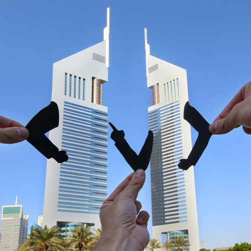 archiemcphee:  Meanwhile London-based artist Rich McCor, aka paperboyo (previously featured here), continues to travel the world using simple paper cutouts to cleverly transform famous landmarks and other buildings into awesome new attractions. Suddenly