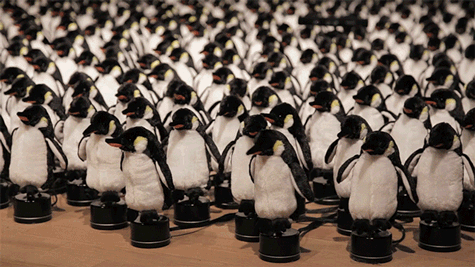 An Interactive Mirror Built From 450 Rotating Penguins By Daniel Rozin