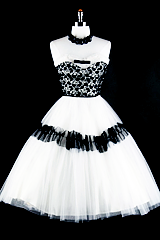 thetackyfemme:thekattcameback:vintagegal:1950s Prom and Party Dresses: Black and WhiteEvery. Single.