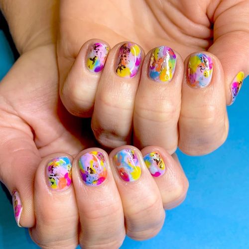 Rainbow color splash! And we couldn’t finish this mani without a dash of gold foil cause, really, it