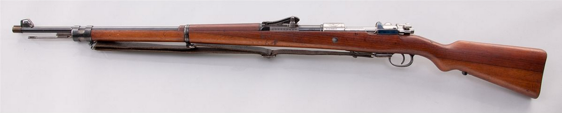 peashooter85:  An excellent condition Model 1909 Peruvian Mauser bolt action rifle.