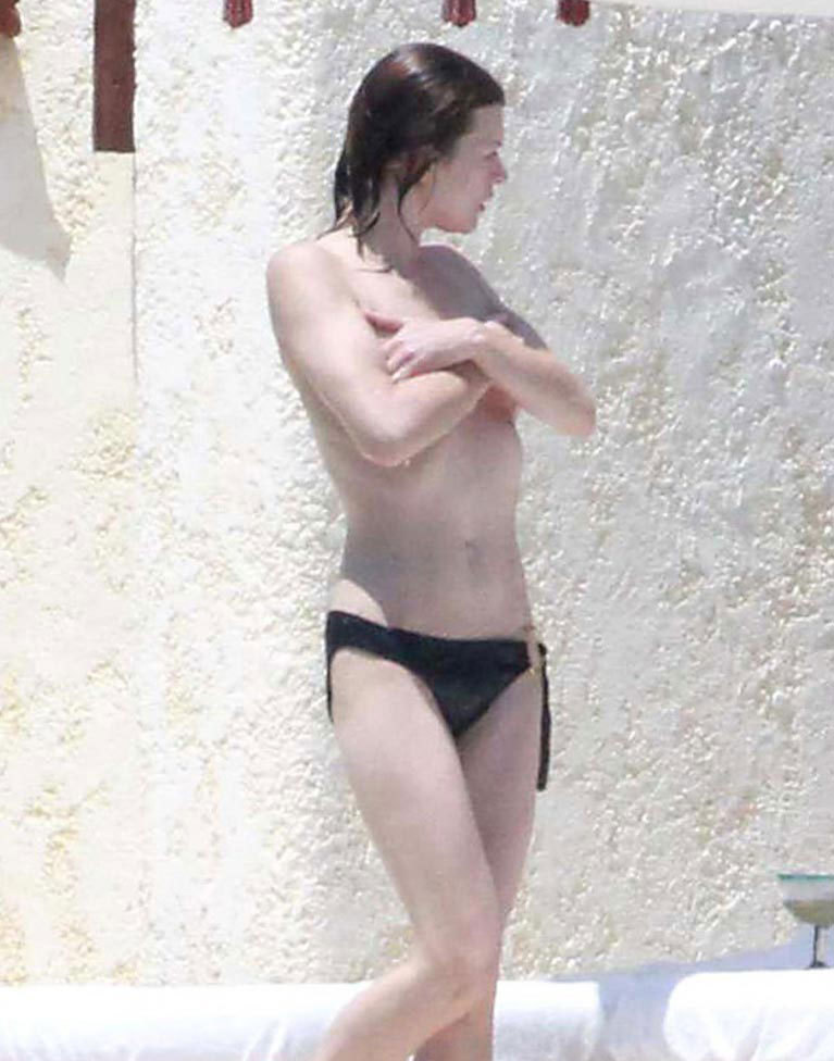 toplessbeachcelebs:  Milla Jovovich (Actress) in a jacuzzi topless in Los Cabos (August