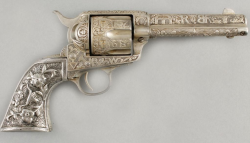  An incredible engraved Colt Single Action