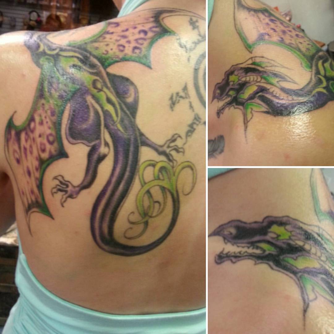 Finally! The finished product💜💚 #tattoo #dragon #purple #green #maleficent