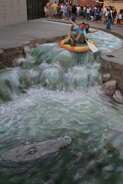 unknowngenre:  3D Pavement Drawings by Julian Beever  Anamorphic illusions are drawn in a special distortion in order to create an impression of 3 dimensions when seen from one particular viewpoint.  more 