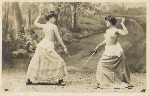 Vintage sexy babes swordfighting topless. This is made of win.