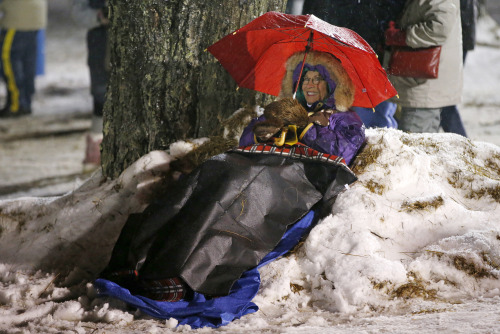 yahoonewsphotos:  Groundhog Day 2015 – Punxsutawney Phil predicts 6 more weeks of winterPunxsutawney Phil, the American groundhog famous for his weather predictions, saw his shadow after emerging from his burrow atop  Gobbler’s Knob in Pennsylvania